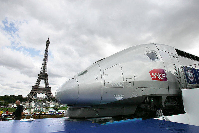 A high-speed TGV train parked in central Paris