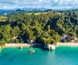 Aerial view of Cathedral Cove and surrounding bays