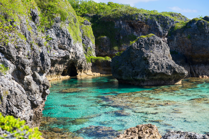 The crystal clear water of Limu Pools, a popular place for swimming and snorkelling, Niue. 