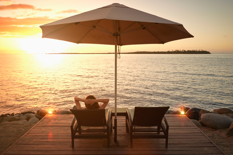 Watch the sunset over the water at Denarau Island